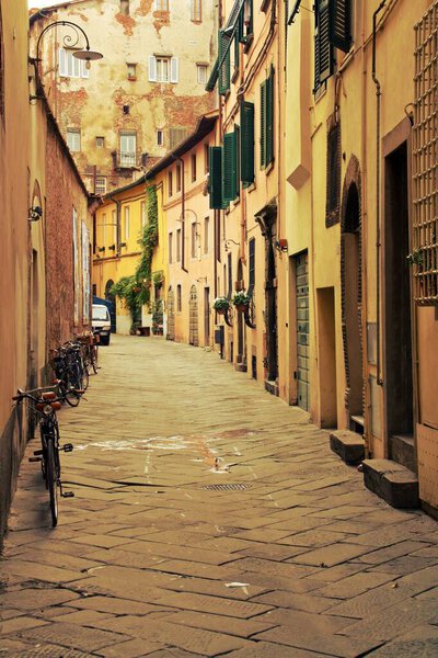 Street of the town of Lucca in Italy. Vintage view.