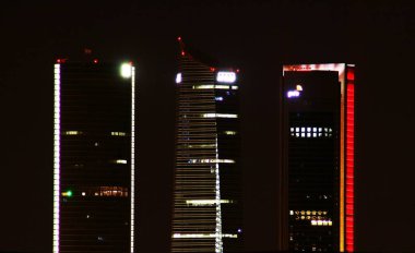 Madrid, Spain; 10 07 2018. Cuatro Torres Business Area (CTBA), skyscrapers of Madrid illuminated at night.