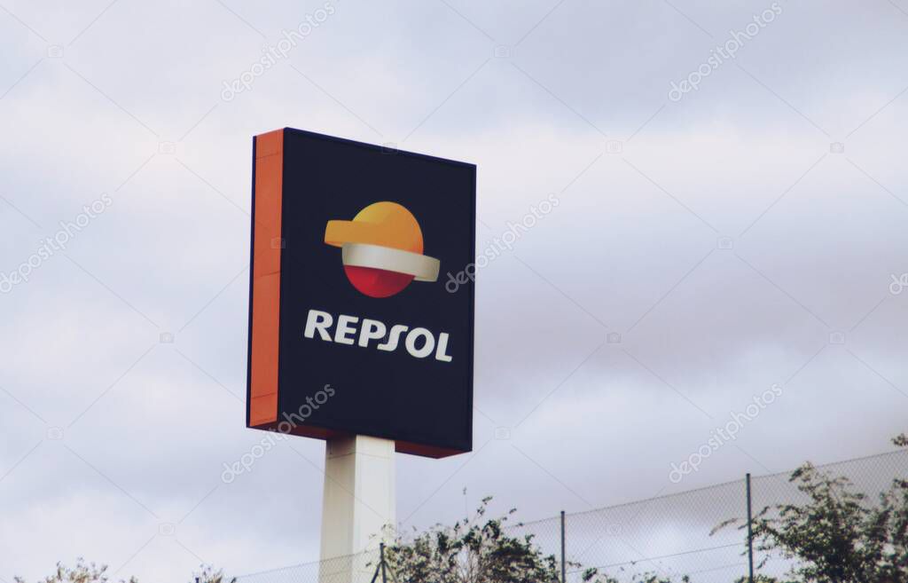 Alcobendas, Spain. 10 27 2018. REPSOL service station on the A1 motorway. Logo of the multinational oil company on a cloudy day.