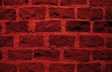 Tuğla bir duvardan kırmızı masaüstü arka planı. Fotoğrafları dijital olarak dönüştüren yaratıcı çalışma.