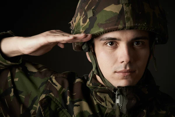 Portrait Of Soldier In Uniform Saluting — Stock Photo, Image