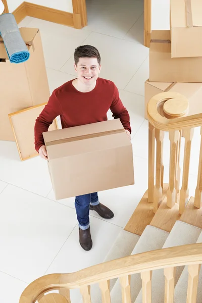 Portrait Of Young Man Moving Into New Home — Stock Photo, Image