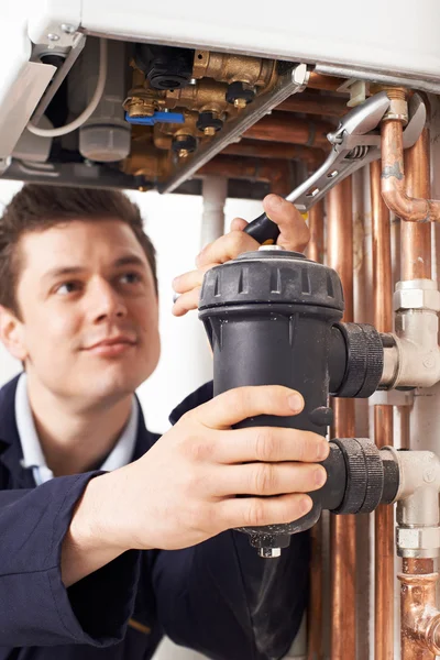 Male Plumber Working On Central Heating Boiler — Stock Photo, Image