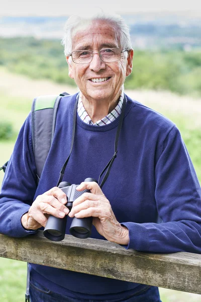 Portrait Of Senior Man On Walk With Binoculars — Stock Photo, Image