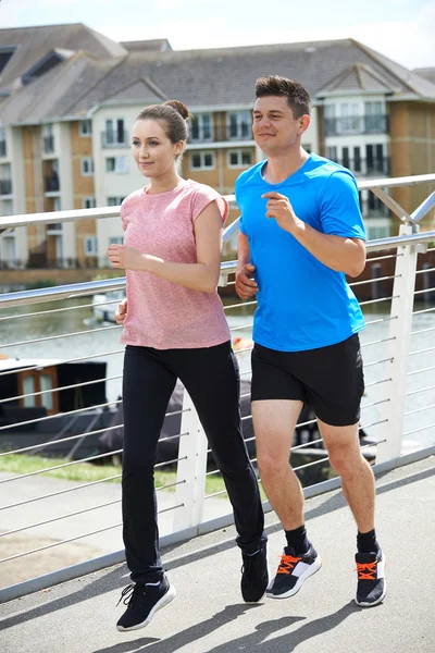 Young Couple Exercising In Urban Environment — Stock Photo, Image