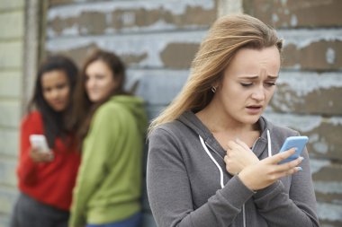 Teenage Girl Being Bullied By Text Message clipart