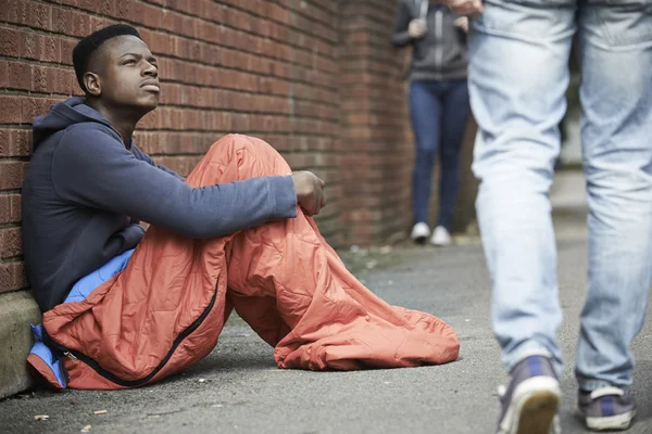 Homeless Teenage Boy In Sleeping Bag On The Street — Stock Photo, Image