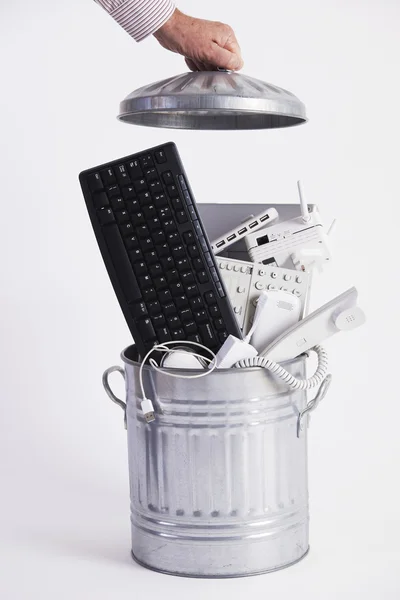 Businessman Filling Garbage Can With Obsolete Office Equipment — Stock Photo, Image