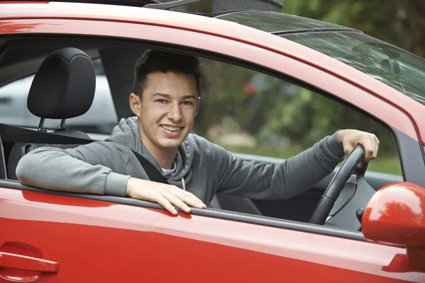 Newly Qualified Teenage Boy Driver Sitting In Car — Stock Photo, Image