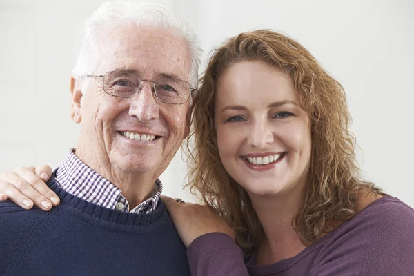 Portrait Of Smiling Senior Man With Adult Daughter — Stock Photo, Image