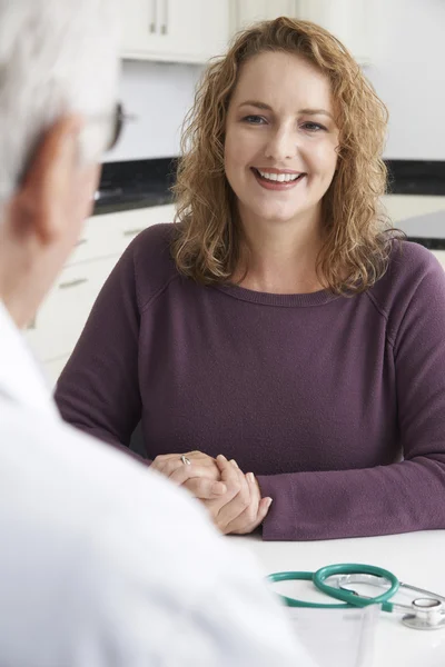 Plus Size Woman Meeting With Doctor In Surgery — Stock Photo, Image