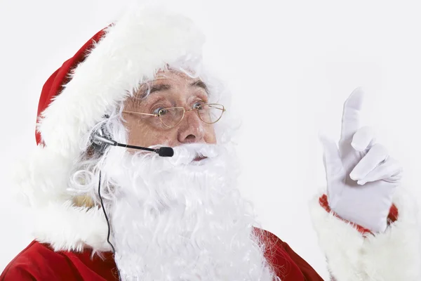 Studio Shot van de Kerstman dragen Headset — Stockfoto