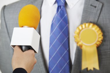 Politician Being Interviewed By Journalist During Election clipart
