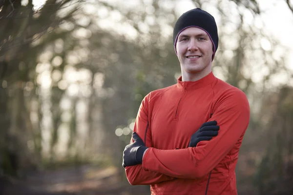 Portrait Of Man On Winter Run Through Woodland — Stock Photo, Image