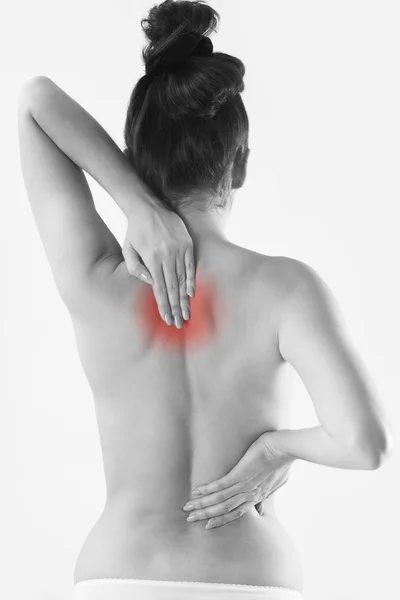 Monochrome Studio Shot Of Woman With Painful Back — Stock Photo, Image