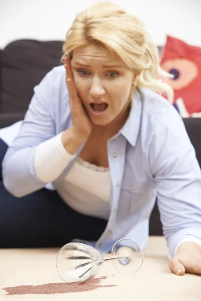 Woman Accidentally Spilling Red Wine On Carpet At Home — Stock Photo, Image