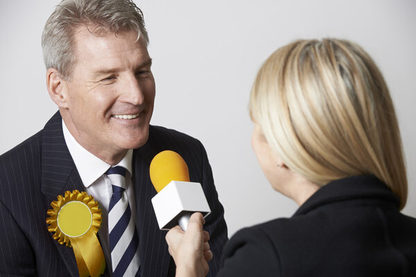 Politician Being Interviewed By Journalist During Election