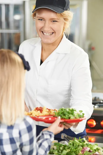 Pupil In School Cafeteria Being Served Lunch By Dinner Lady — Stock Photo, Image