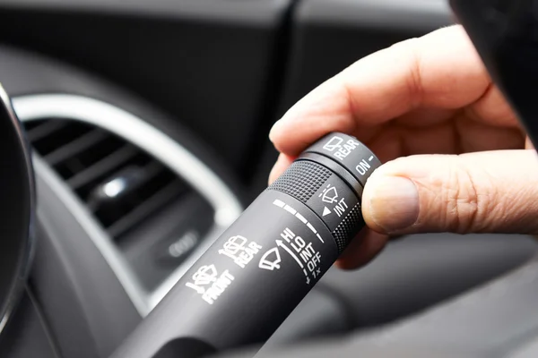 Close Up Of Hand Operating Windscreen Wiper Control In Car — Stock Photo, Image