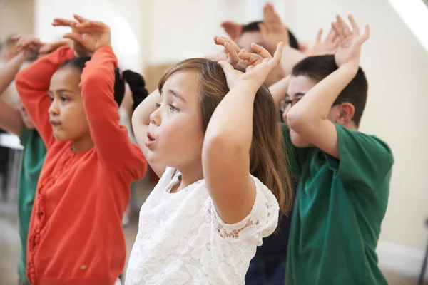 Group Of Children Enjoying Drama Class Together