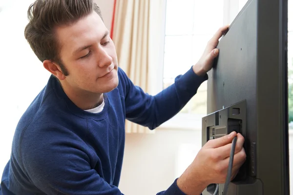 Television Engineer Installing New TV At Home — Stock Photo, Image