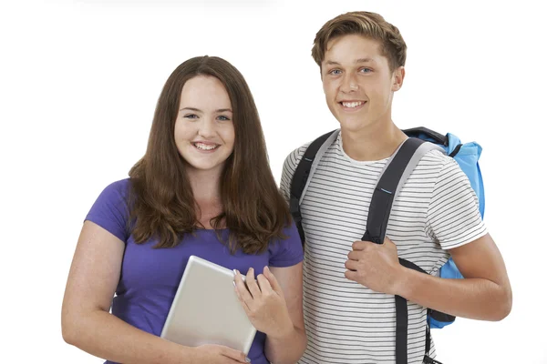 Retrato de estúdio de casal adolescente estudante — Fotografia de Stock