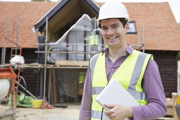Architect On Building Site Using Digital Tablet — Stock Photo, Image