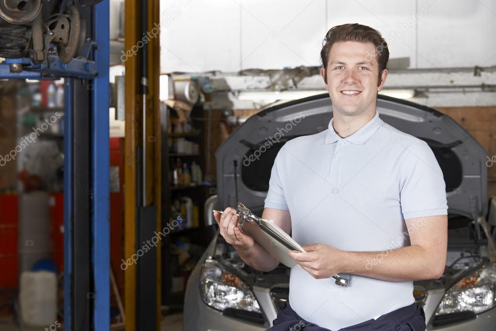 Portrait Of Mechanic In Auto Repair Shop