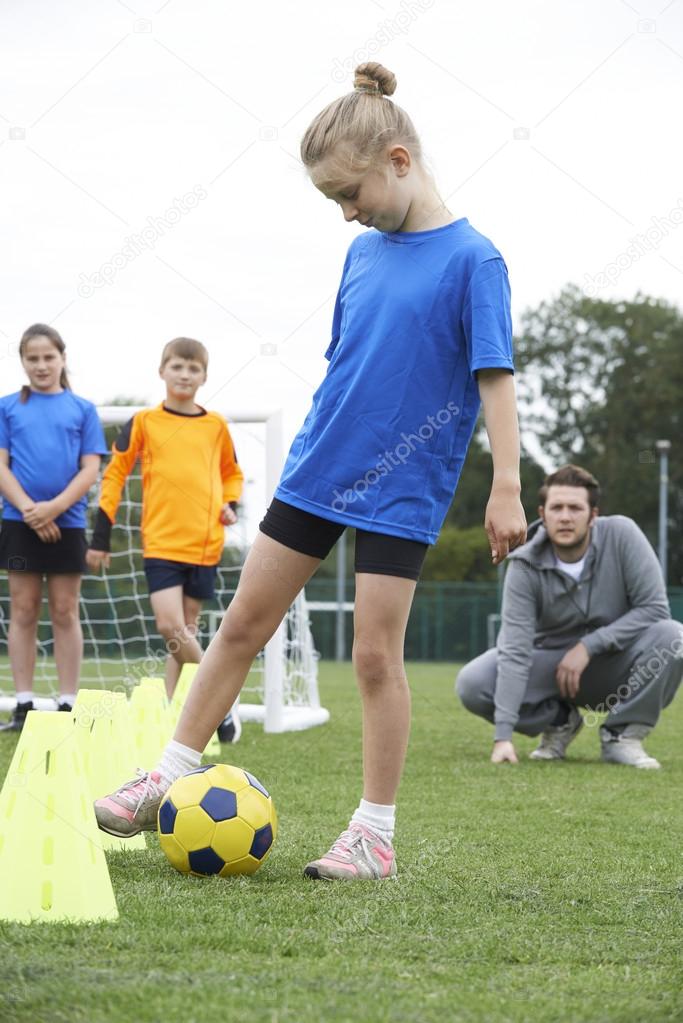 Coach Leading Outdoor Soccer Training Session