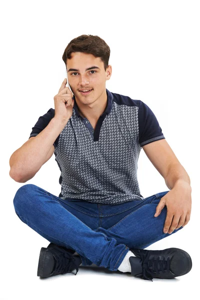 Studio Portrait Of Teenage Boy Talking On Mobile Phone — Stock Photo, Image