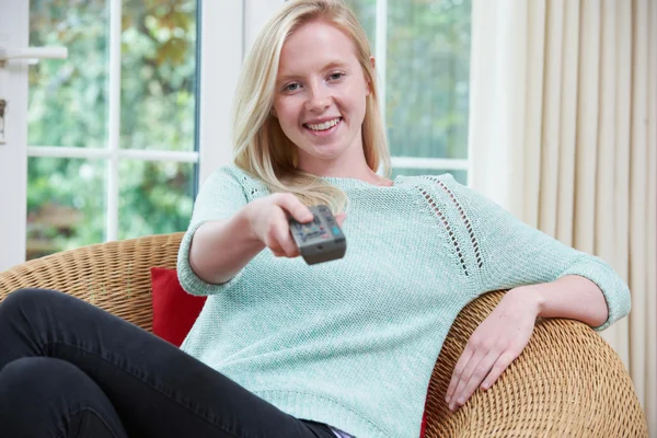 Teenage Girl Relaxing And Watching TV At Home — Stock Photo, Image