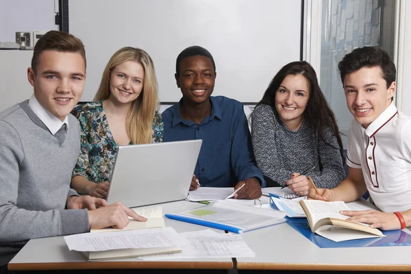 Group Of Teenage Students Working In Classroom — Stock Photo, Image