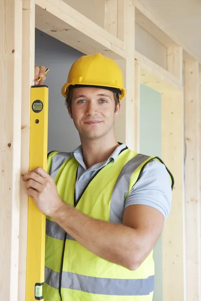Builder Checking Work With Spirit Level — Stock Photo, Image