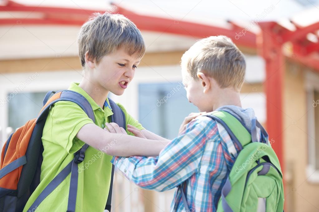 Two Boys Fighting In School Playground