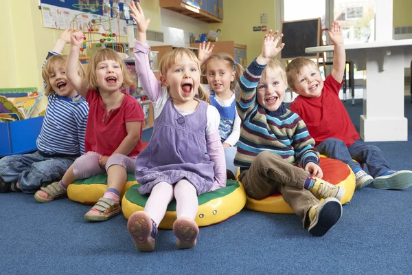 Group Of Pre School Children Answering Question In Classroom — Stock Photo, Image