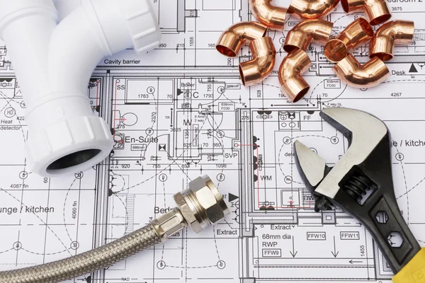 Plumbing Components Arranged On House Plans — Stock Photo, Image