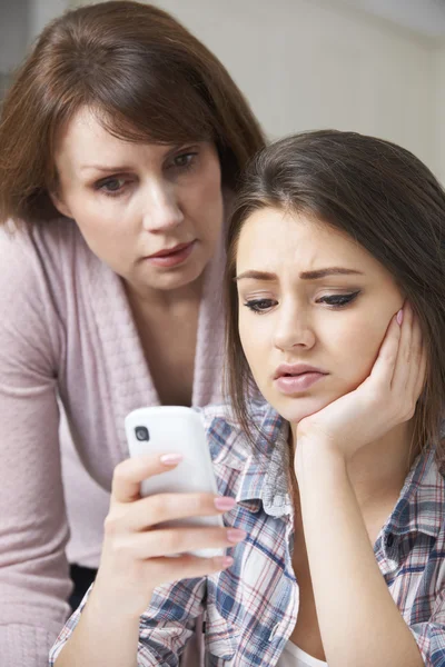 Mother Comforting Daughter Being Bullied By Text Message — Stock Photo, Image