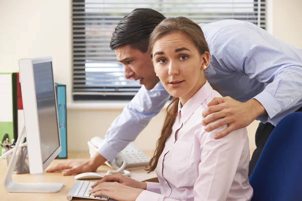 Businessman Sexually Harassing Female Colleague — Stock Photo, Image