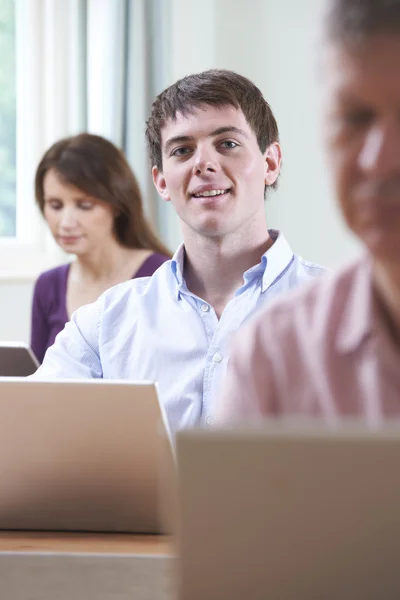 Young Man In Adult Education Class — Stock Photo, Image