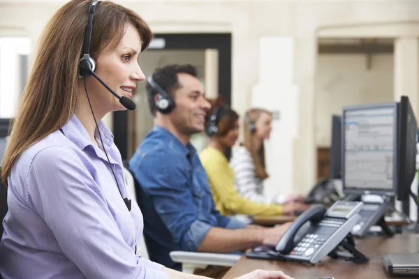 Female Customer Services Agent In Call Centre — Stock Photo, Image