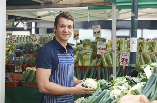 Owner Of Vegetable Stall At Market — Stock Photo, Image