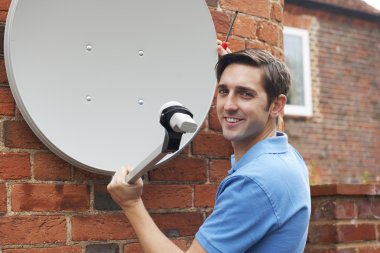 Engineer Installing TV Satellite Dish clipart