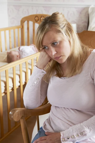 Mother In Nursery Suffering From Post Natal Depression — Stock Photo, Image