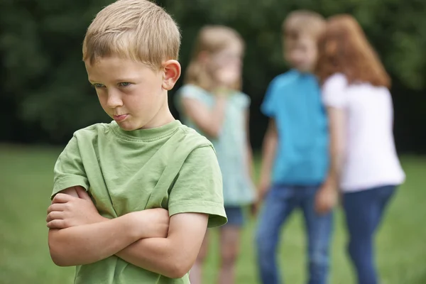 Unhappy Boy Being Gossiped About By Other Children — Stock Photo, Image