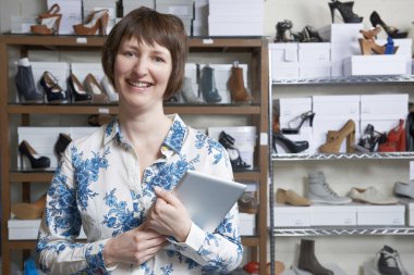 Woman Running Online Shoe Business clipart