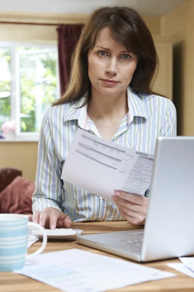 Worried Middle Aged Woman Looking At Home Finances — Stock Photo, Image