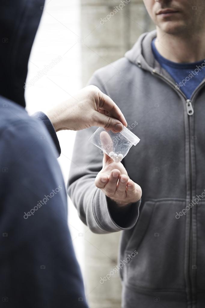 Man Buying Drugs On The Street