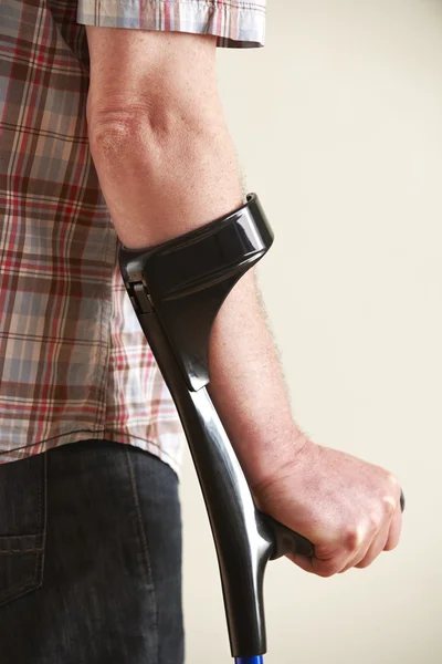 Close Up Of Man Using Crutches — Stock Photo, Image