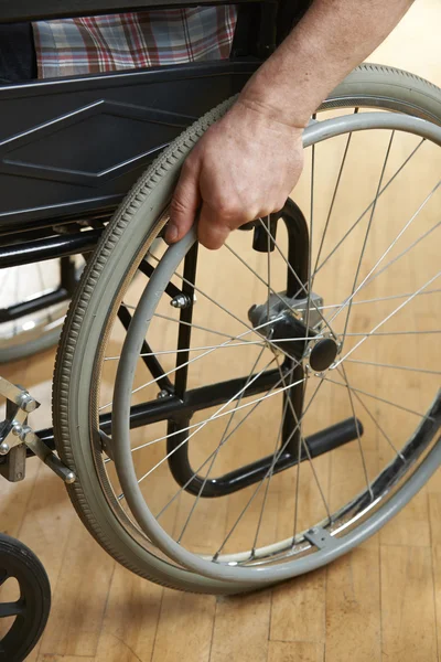 Close Up Of Man 's Hands On Wheelchair — стоковое фото