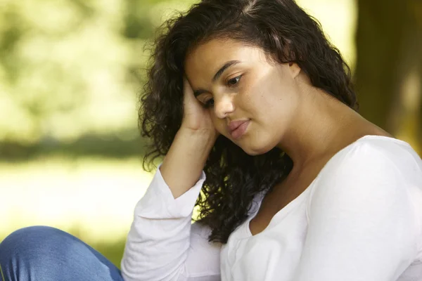 Depressed Young Woman Sitting Outdoors — Stock Photo, Image